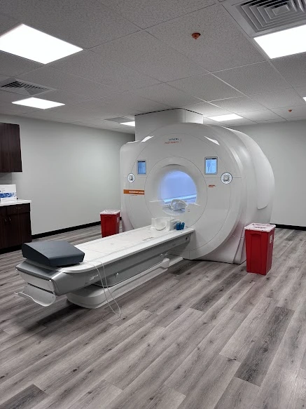 Physician preparing exam table